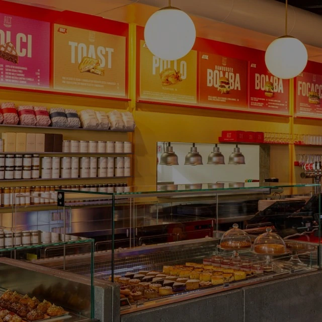 Fresh and packaged confectionery products at the counter of an ALT store